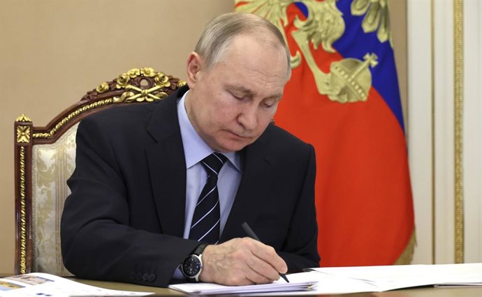 May 16, 2023, Moscow, Moscow Oblast, Russia: Russian President Vladimir Putin writes a note during a video conference with Amur Region Governor Vasily Orlov from the Kremlin, May 16, 2023 in Moscow, Russia.