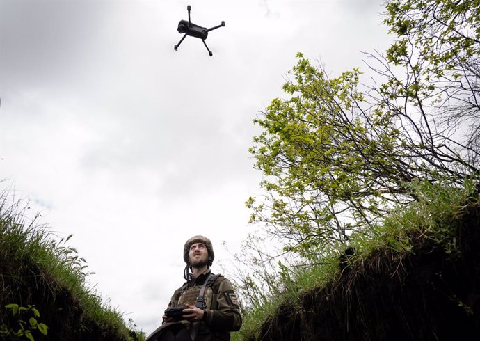 April 25, 2023, Soledar, Donetsk, Ukraine: A Ukrainian soldier flies a drone from trenches near Soledar. Drone reconnaissance has been playing an important role in the war, as they not only act as surveillance but also carry out attack missions.
