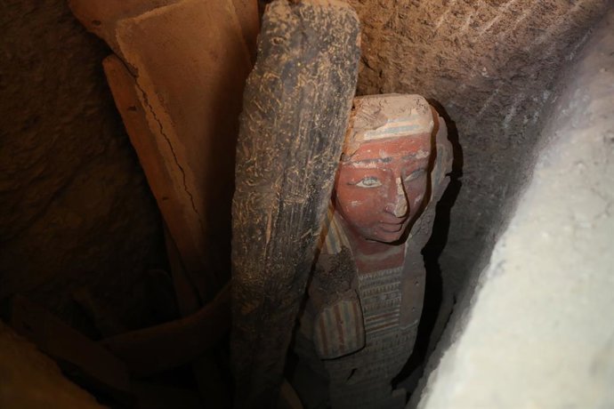CAIRO, May 27, 2023  -- This photo taken on May 27, 2023 shows a piece of human-shaped coffin lid unearthed at the archaeological site in Saqqara necropolis, south of the capital Cairo, Egypt. Egypt announced on Saturday the discovery of two ancient emb