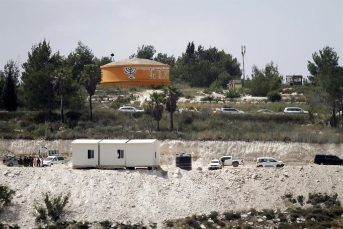 May 29, 2023, Nablus, West Bank, Palestinian Territory: Israeli settlers gather outside a portable building under construction at the illegal former settler outpost of Homesh in the occupied West Bank on May 29, 2023. Israeli settlers said on Monday tha