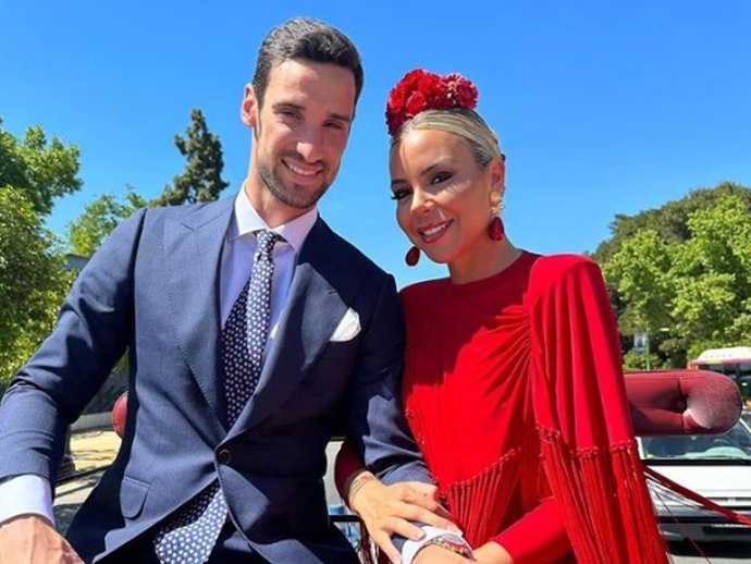 Sergio Rico y Alba Silva en la Feria de Abril