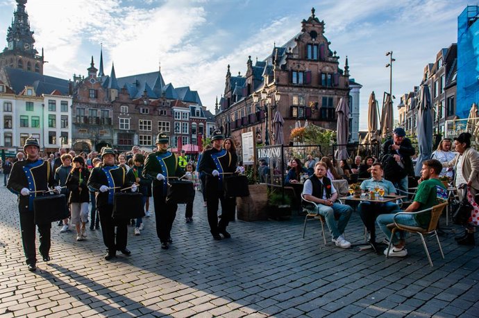 May 4, 2023, Nijmegen, Netherlands: A music band is seen leading the procession. On this day, around the whole country, ceremonies are held to commemorate civilians and soldiers around the world during World War II and other conflicts. In Nijmegen, a ce