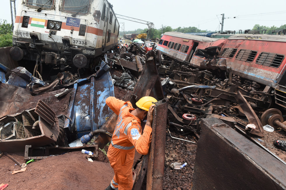 NEW DELHI, June 3, 2023 -- A rescuer works at the site of a train collision in Balasore district in the eastern Indian state of Odisha, June 3, 2023.