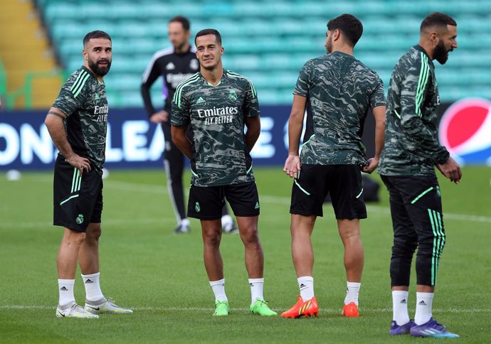 Archivo - 05 September 2022, United Kingdom, Glasgow: (L-R) Real Madrid's Dani Carvajal, Lucas Vazquez, Marco Asensio and Karim Benzema take part in a training session at Celtic Park, ahead of Tuesday's UEFA Champions League Group F soccer match against C