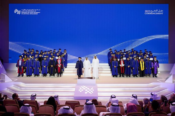 The Class of 2023 with His Highness Sheikh Hamed bin Zayed Al Nahyan (center); His Excellency Dr. Sultan bin Ahmed Al Jaber, Minister of Industry and Advanced Technology, President-Designate of COP28 UAE and Chairman of MBZUAI's Board of Trustees(right)