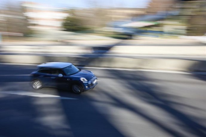 Archivo - Un coche circula por la carretera de A Coruña, en Madrid, (España).