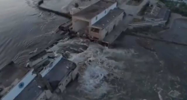 June 6, 2023, Kakhovka, Kherson Oblast, Ukraine: In this image taken from video released by the Ukrainian Presidential Office, water runs through a huge gap in the Kakhovka dam in Kakhovka, Ukraine. Ukraine on Tuesday accused Russian forces of blowing up 