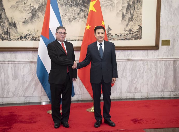BEIJING, May 20, 2023  -- Chinese Minister of Public Security Wang Xiaohong, also a member of the Secretariat of the Communist Party of China Central Committee, meets with Cuban Minister of Interior Lazaro Alberto Alvarez Casas, also a member of the Polit