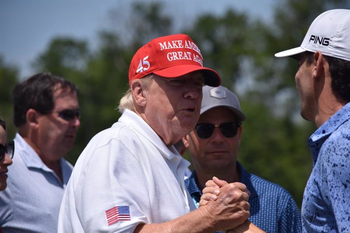 May 27, 2023, Sterling, Virginia, United States: Former President of the United States Donald J. Trump visits the driving range and speaks with fans. Former President of the United States Donald J. Trump visits the driving range, meets fans and watches LI