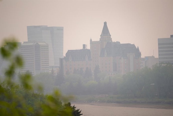 May 20, 2023, Saskatoon, SK, Canada: The Delta Hotels Bessborough is photographed through thick smoke from wildfires burning across the Prairies, in Saskatoon, Sask., on Saturday, May 20, 2023. The Saskatchewan Public Safety Agency says it may need extr