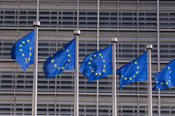 May 19, 2023, Brussels, France, Belgium: Brussels, Belgium Mai 19, 2023 - European flags fly at the entrance of the European Commission headquarters. The European Commission has revised the growth outlook upwards to 1% in 2023 in the EU, compared to 0.8