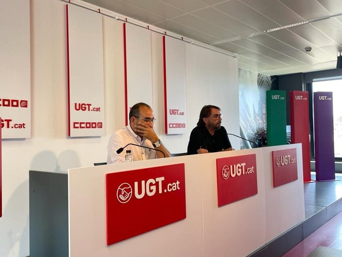 Los secretarios generales de UGT y CC.OO. De Catalunya, Camil Ros y Javier Pacheco, en rueda de prensa.