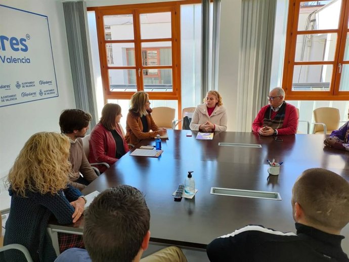 Foto de archivo de una reunión de Fuerza Migrante con el PP