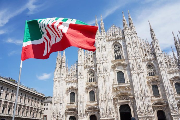 The state funeral of the Italian politician and businessman Silvio Berlusconi in the Duomo. In the photo: the Forza Italia flag waving in front of the cathedral. Milan (Italy), June 14th, 2023