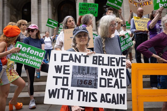 April 15, 2023, New York, New York, United States: An abortion rights activist holds a sign in a protest after the Supreme Court issued a temporary 5-day stay on restricting access to the abortion pill mifepristone on April 15, 2023 in New York City. Ci