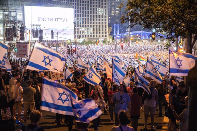 June 10, 2023, Tel Aviv, Israel: Tens of thousands of protesters wave Israeli flags during a demonstration against the judicial reform.