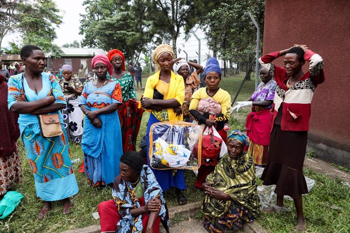 KASESE, June 19, 2023  -- Relatives of victims killed by rebels grieve as they wait outside the Bwera hospital mortuary in Mpondwe, Uganda, June 18, 2023. Calm has returned to Mpondwe town in Uganda's southwestern district of Kasese, where the Allied Demo