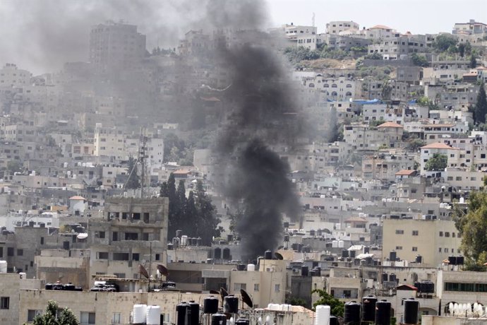 July 3, 2023, Jenin, West Bank, Palestinian Territory: Smoke rises from the buildings after Israeli forces conducted airstrikes and raid on the city of Jenin, West Bank  on July 3, 2023. Eight Palestinians were so far killed and dozens injured, many of th
