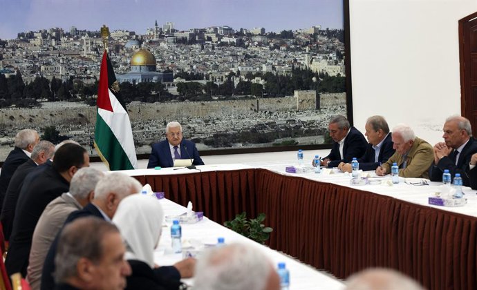 RAMALLAH, July 3, 2023  -- Palestinian President Mahmoud Abbas (C, Rear) chairs an emergency meeting of the Palestinian leadership in the West Bank city of Ramallah, on July 3, 2023. Palestine on Monday decided to stop all contacts, meetings and securit