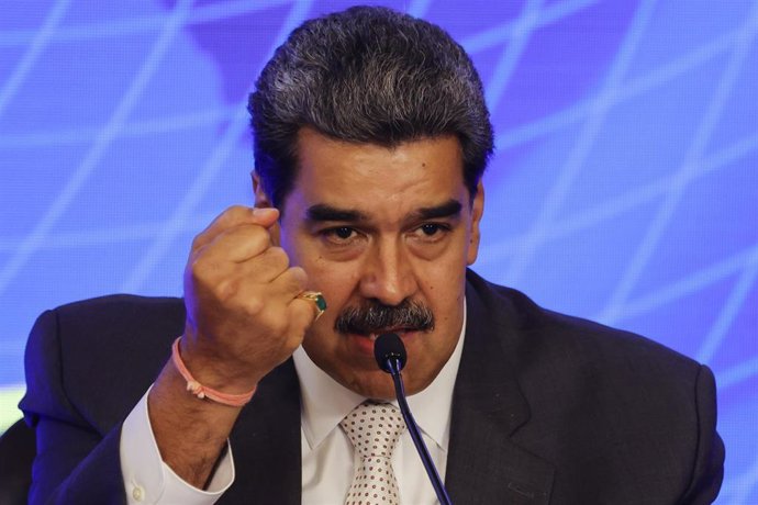 12 June 2023, Venezuela, Caracas: Venezuelan President Nicolas Maduro speaks during a meeting with Iranian President Ebrahim Raisi at the Miraflores Presidential Palace in Caracas. Photo: Jesus Vargas/dpa