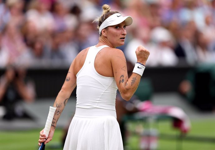 15 July 2023, United Kingdom, London: Czech tennis player Marketa Vondrousova celebrates a point against Tunisian Ons Jabeur during their women's singles final tennis match on Day Thirteen of the 2023 Wimbledon Championships at the All England Lawn Tenn