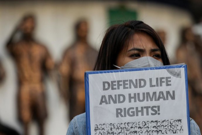 July 18, 2023, Quezon City, Metro Manila, Philippines: A woman holds a sign as human rights groups supporting families of victims of former Philippine president Rodrigo Duterte's war on drugs rally to celebrate the International Criminal Court's decisio