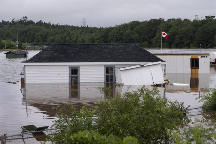 July 22, 2023, Halifax, NS, Canada: Buildings are seen in floodwater following a major rain event in Halifax on Saturday, July 22, 2023. A long procession of intense thunderstorms have dumped record amounts of rain across a wide swath of Nova Scotia, ca
