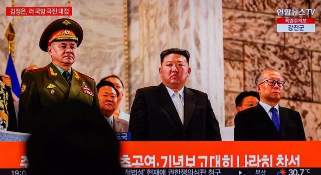 July 28, 2023, Seoul, South Korea: A TV screen shows an image of North Korean leader Kim Jong Un (C) with Russian Defense Minister Sergei Shoigu (L) and Chinese Communist Party politburo member Li Hongzhong (R) at a military parade to mark the 70th annive