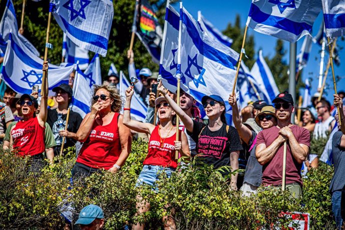 July 24, 2023, Jerusalem, Israel: Protestors gesture and chant after hearing the vote results during an anti-judicial overhaul demonstration in Jerusalem. Israel's parliament approved the first major law in Prime Minister Benjamin Netanyahu's contentiou