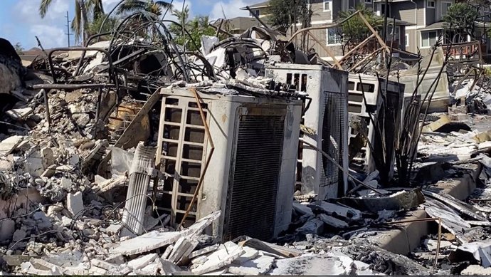 LAHAINA (U.S.), Aug. 15, 2023  -- The photo taken with a mobile phone on Aug. 14, 2023 shows the aftermath of wildfires in Lahaina town, Maui Island, Hawaii, the United States. The death toll from the Maui wildfires reached 99, authorities said Monday. 
