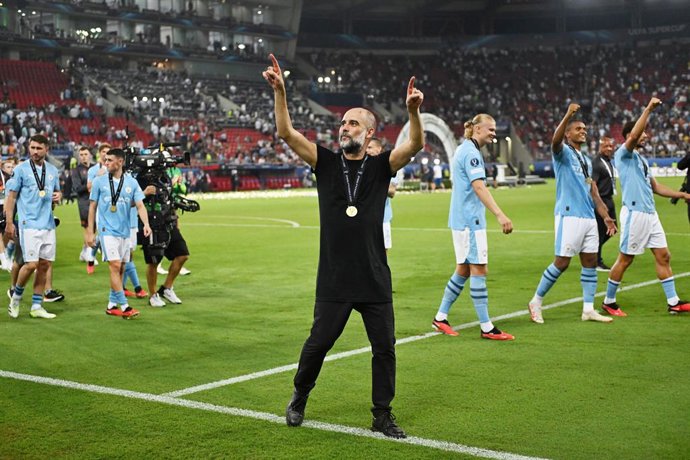 Manchester City manager Pep Guardiola celebrates after winning the UEFA Super Cup 2023 football match between Manchester City and Sevilla FC on August 16, 2023 at Georgios Karaiskakis Stadium in Athens, Greece - Photo Vinny Orlando / LiveMedia / DPPI
