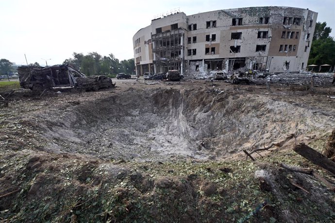11 August 2023, Ukraine, Zaporizhzhia: The crater from a Russian missile attack is seen outside a hotel in Zaporizhzhia. Photo: -/Ukrinform/dpa