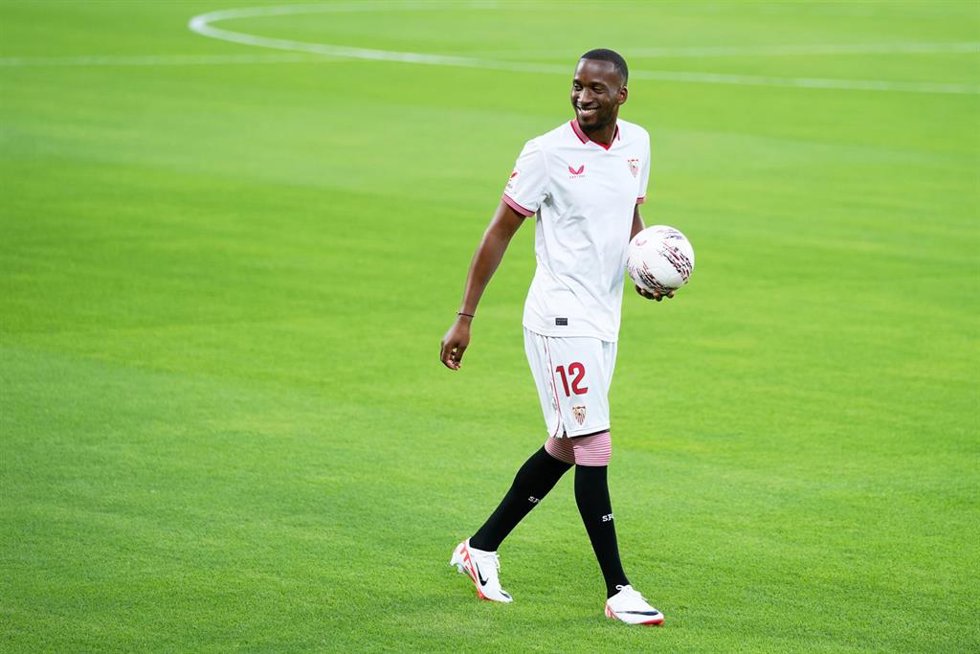 Dodi Lukébakio poses for photo during their presentation as new players of Seville FC at Ramon Sanchez-Pizjuan stadium on August 24, 2023 in Sevilla, Spain.