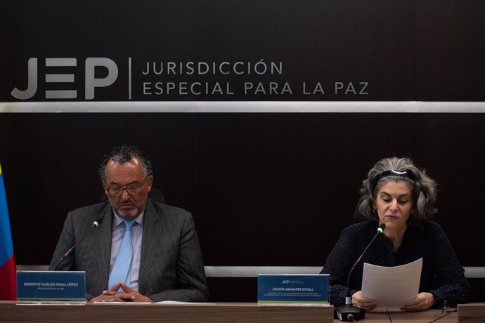 Archivo - July 7, 2023, Bogota, Cundinamarca, Colombia: The president of the special jurisdiction for peace, Roberto Carlos Vidal Lopez, and judge Julieta Lemaitre Ripoll speak during the JEP's indictment of 10 former members of the FARC for war crimes 