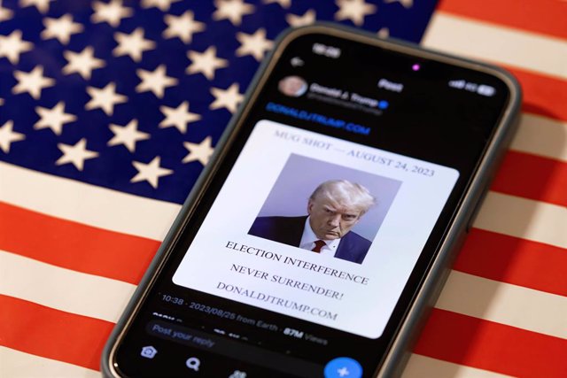 August 25, 2023, Japan: In this photo illustration, Donald J. Trump came back to X formerly known as Twitter to post his mugshot from in a xeet/tweet. Donald J. Trump posted his mugshot on his X account in defiance of his arrest in Atlanta, Georgia and to