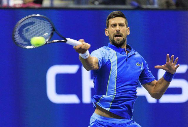 28 August 2023, US, New York: Serbian tennis player Novak Djokovic in action against France's Alexandre Muller during the US Open tennis tournament men's singles first round match at the USTA Billie Jean King National Tennis Center. Photo: Javier Rojas/PI