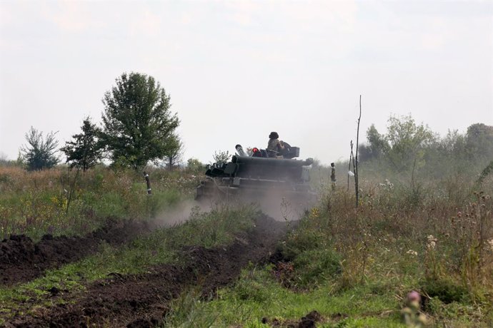 August 16, 2023, Kharkiv Region, Ukraine: KHARKIV REGION, UKRAINE - AUGUST 16, 2023 - A serviceman rides a tank as the military personnel of the 41st Separate Mechanized Brigade of the Ukrainian Armed Forces prepare for combat missions, Kharkiv Region, 