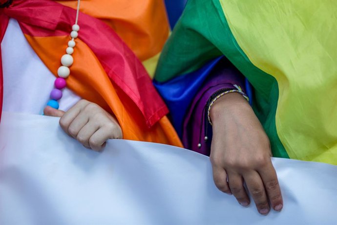 Archivo - July 1, 2023, Madrid, Spain: Children wrapped with LGTBI+ flags hold a banner, during the Pride March in Madrid. Thousands of people participated in the pride parade in Madrid under the slogan ''For our rights, for our lives: with Pride'', thr