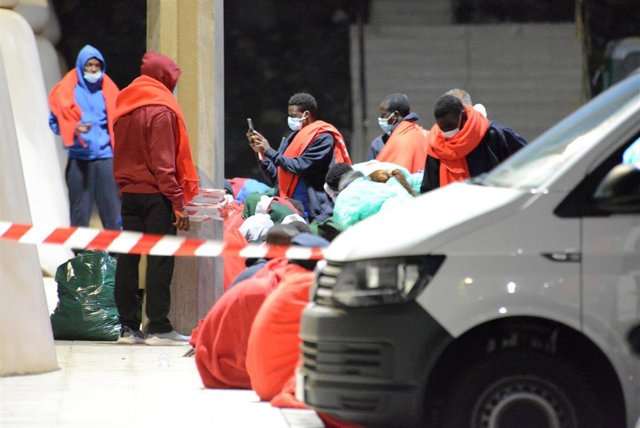 A boat with 43 people on board is rescued in waters near El Hierro File - Health personnel from the Canary Islands Emergency Service (SUC) and the Red Cross treat several migrants upon their arrival at the La Restinga dock after being rescued from a boat, on August 23, 2021, on the island of El Hierro, August 22, 202