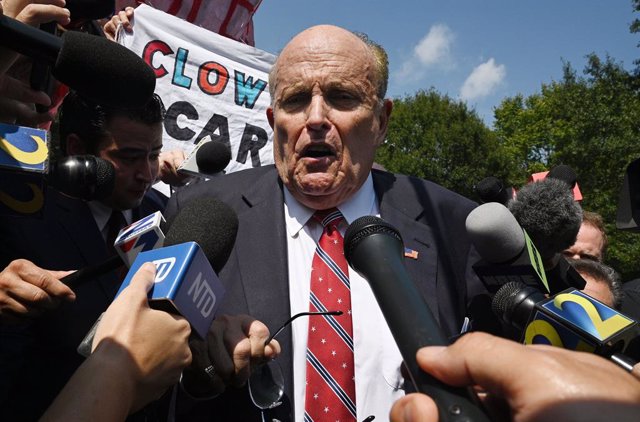 September 1, 2023: Rudy Giuliani speaks to members of the press before he leaves outside the Fulton County Jail, Wednesday, Aug. 23, 2023, in Atlanta.