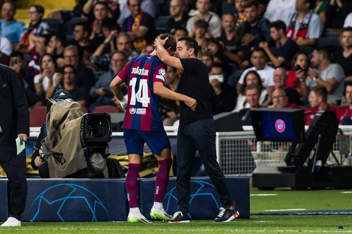 Joao Felix of FC Barcelona saludates to Xavi Hernandez, Head coach of Fc Barcelona during the UEFA Champions League Group H  match played between FC Barcelona and Royal Antwerp FC at Estadi Olimpic Lluis Companys on September 19, 2023 in Barcelona, Spai
