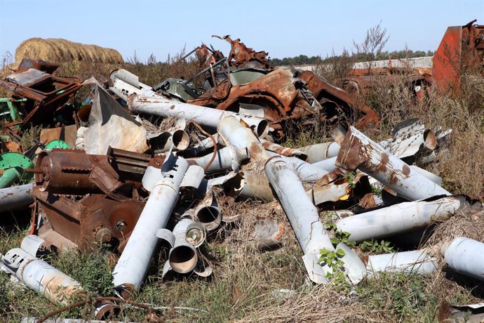 September 27, 2023, Lukashivka, Chernihiv Region, Ukraine: LUKASHIVKA, UKRAINE - SEPTEMBER 27, 2023 - The fragments of Russian shells are piled on the ground at the Naporivske Farm that was affected by the shelling of Russian troops, Lukashivka, Chernih