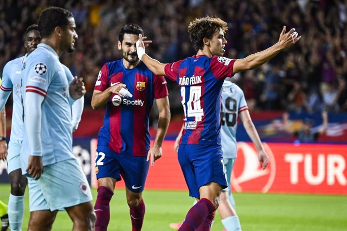 Barcelona's Joao Felix celebrates scoring his side's first goal during the UEFA Chamions League Group H soccer match between FC Barcelona and Royal Antwerp FC at Lluis Companys Olympic Stadium
