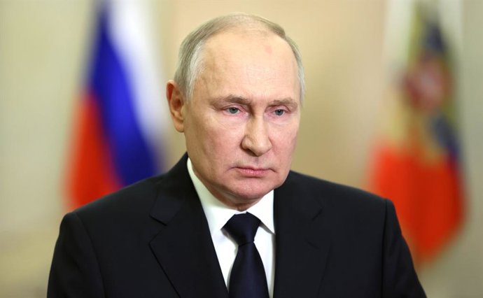 HANDOUT - 30 September 2023, Russia, Moscow: Russian President Vladimir Putin speaks during a video message on the occasion of the Day of Reunification of the Donetsk People's Republic (DPR), Lugansk People's Republic (LPR), Zaporizhzhia and Kherson reg