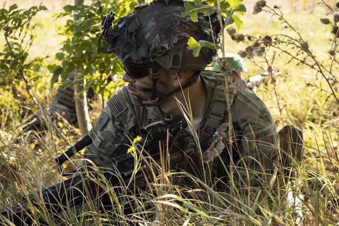 September 19, 2023 - Chisinau, Moldova - U.S. Army Pfc. Caleb Brown, an infantryman with Bravo Company, 2nd Battalion, 327th Infantry Regiment, takes cover while conducting a field training exercise during Rapid Trident 23, near Chisinau, Moldova, Sept.