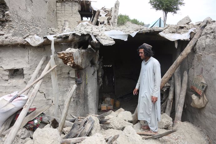Archivo - PAKTIKA, July 1, 2022  -- A man stands by the rubble of a house damaged in an earthquake in Paktika province, Afghanistan on June 28, 2022. Thousands of families have been left homeless following a devastating quake that struck the Gayan distric
