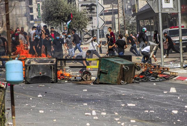 Enfrentamientos entre manifestantes palestinos y la Policía de Israel.