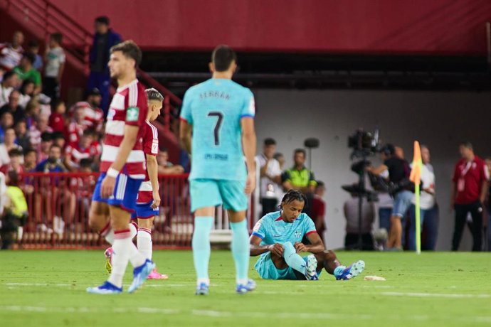 Jules Kounde of FC Barcelona gets injured during the Spanish league, La Liga EA Sports, football match played between Granada CF and FC Barcelona at Los Carmenes stadium on October 8, 2023, in Granada, Spain.