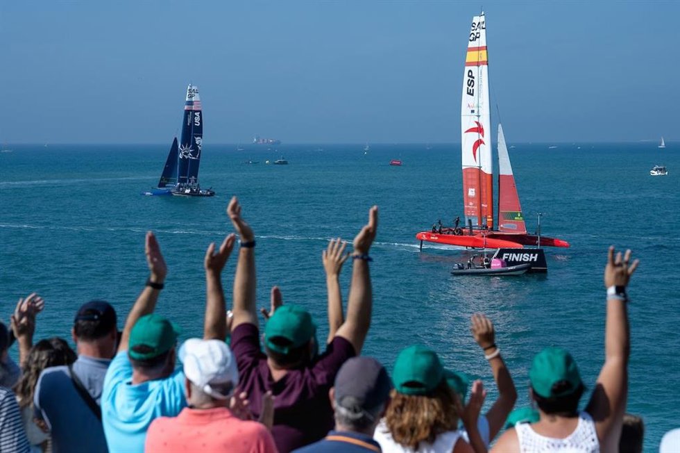 Spectators applaud Spain SailGP Team helmed by Diego Botin and USA SailGP Team helmed by Jimmy Spithill on Race Day 1 of the Spain Sail Grand Prix in Cadiz, Spain.