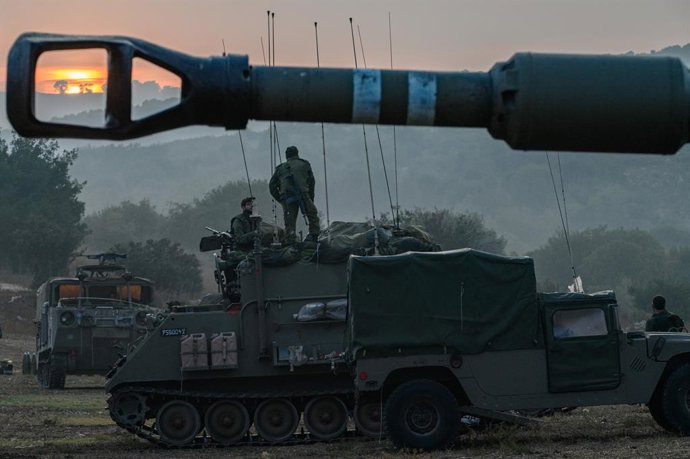 JERUSALEM, Oct. 8, 2023  -- This photo taken on Oct. 8, 2023 shows Israeli military vehicles in northern Israel near the border with Lebanon.   Dozens of rockets and heavy artillery shells were fired toward Israeli positions on the Shebaa Farms, a dispu